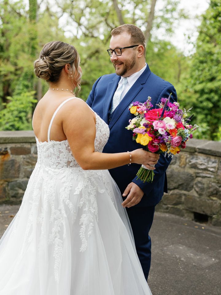 Bride and groom share a first look.