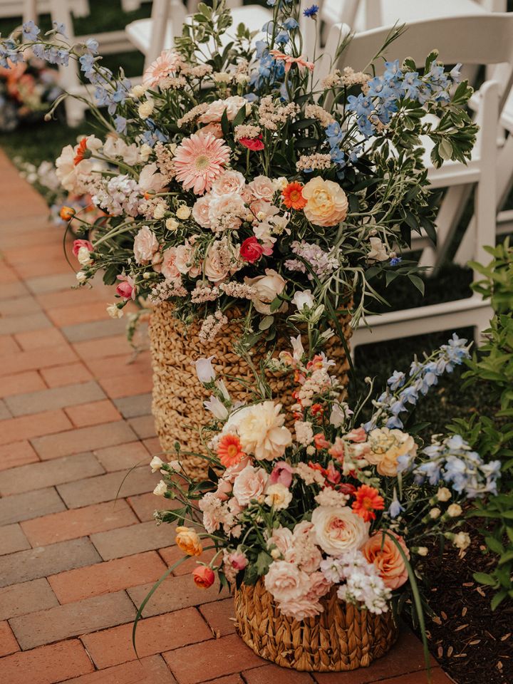 Large flower basket arrangements with spring flowers.