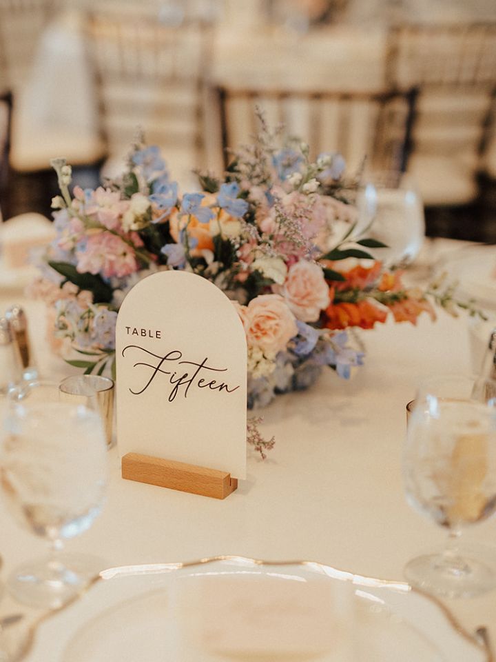Table centerpiece with a spring color flower arrangement.