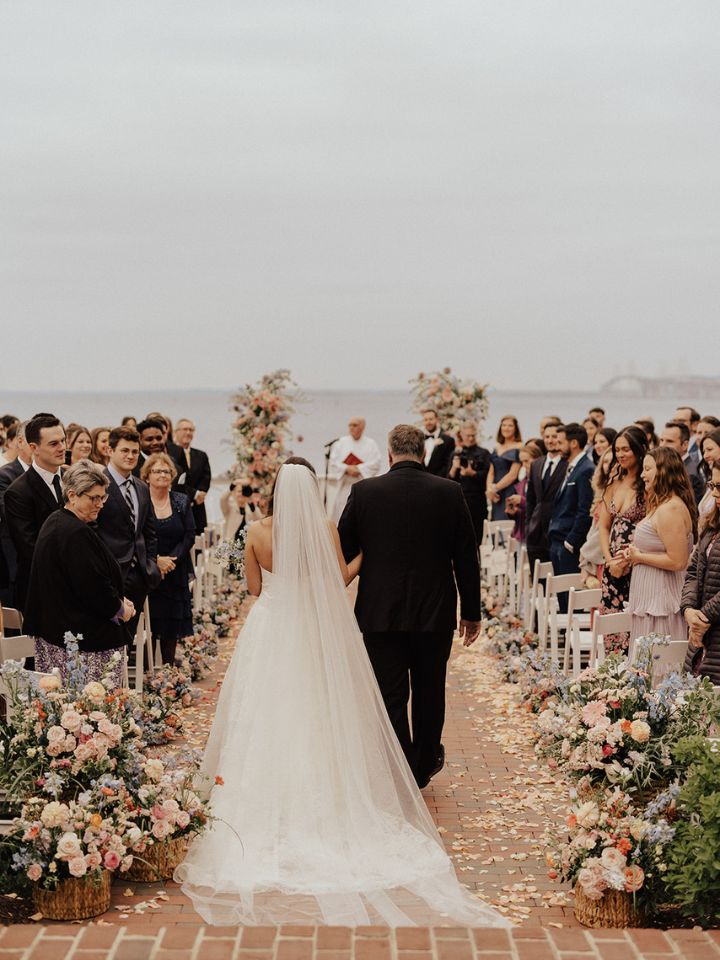 Father of Bride walks daughter down the aisle.